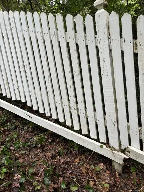 White picket fence after washing